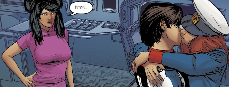 Minmei looking on as Rick and Lisa kiss, and she doesn't seem amused by it.