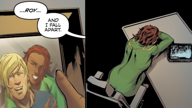 Claudia holding a framed photo of her and Roy, smiling and being happy. Then she places her head in her arms as she cries on the tabletop.
