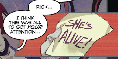 Someone's hand, holding a note with only two words: "She's Alive!"