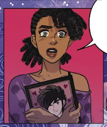Aahna clutching a framed picture of Rick close to her chest.