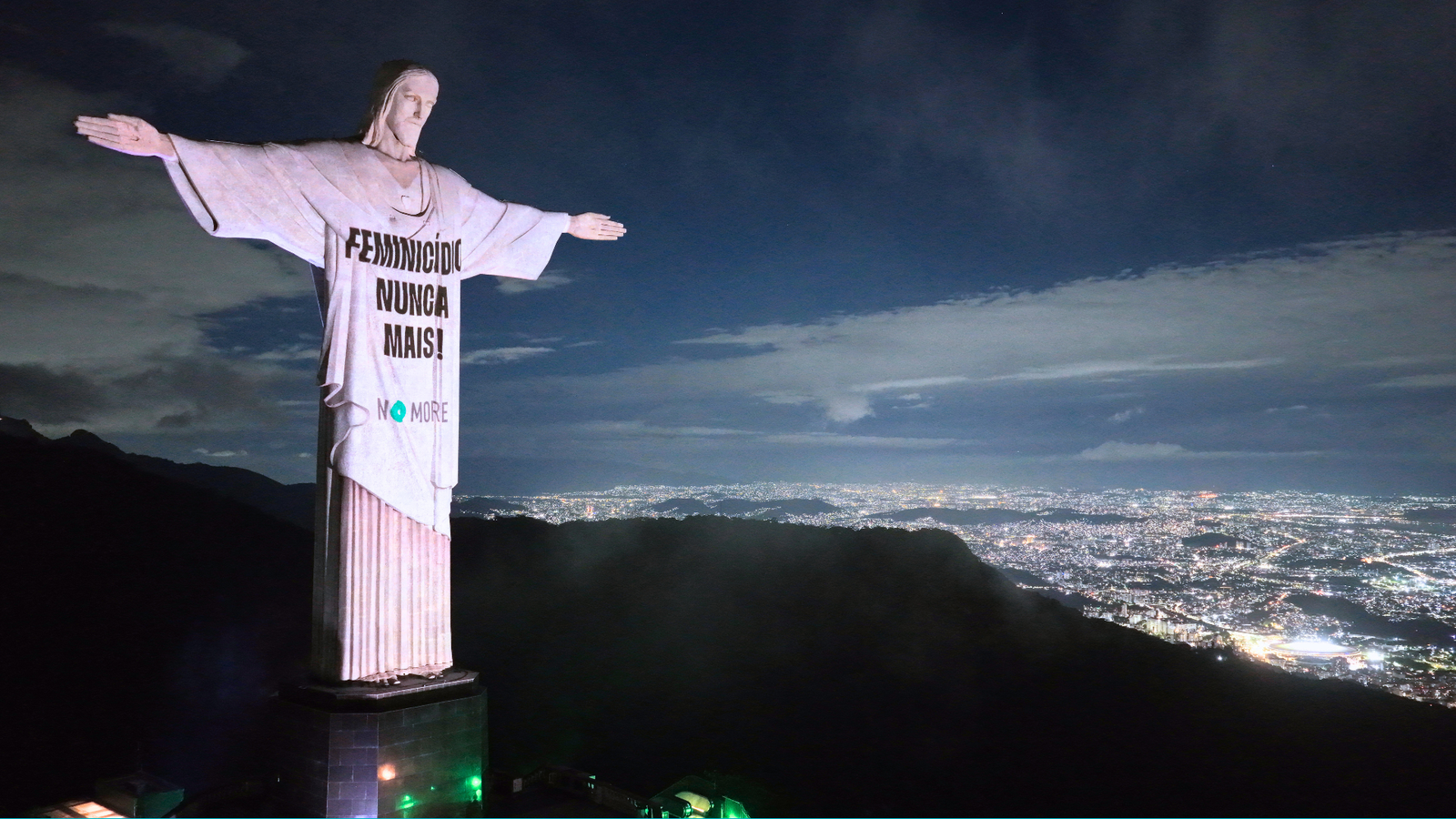 Christ the Redeemer, lit in NO MORE teal