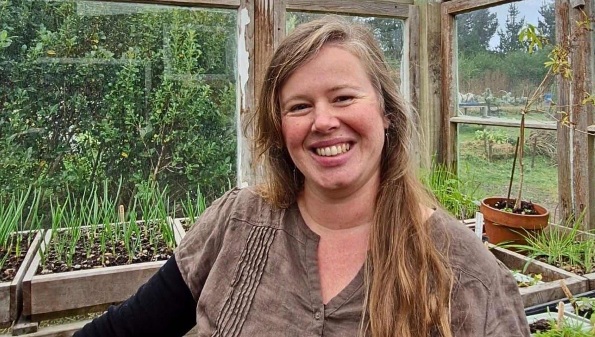 The adorable Setha Davenport of Setha's Seeds standing in her potting shed