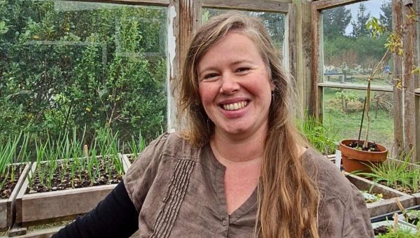 The adorable Setha Davenport of Setha's Seeds standing in her potting shed