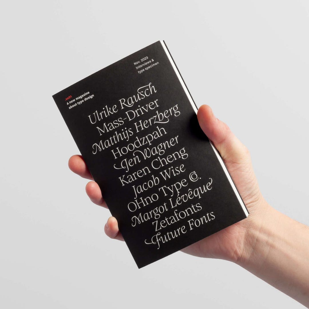 Photo of a hand holding the .ss01 magazine.