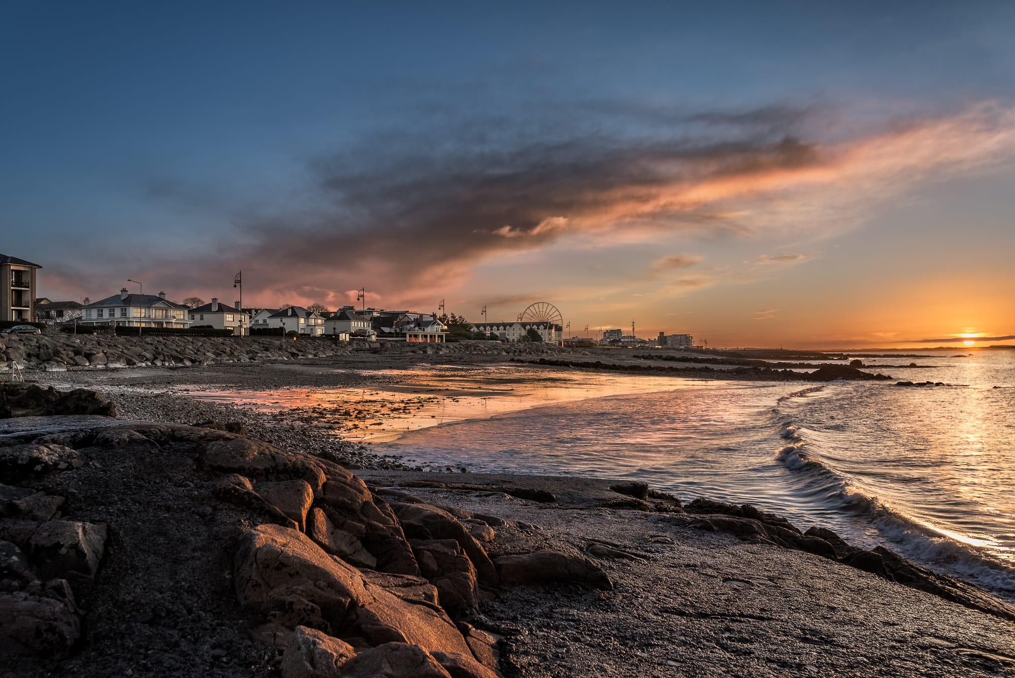 Image of a beach in Salthill, Galway at sunset.