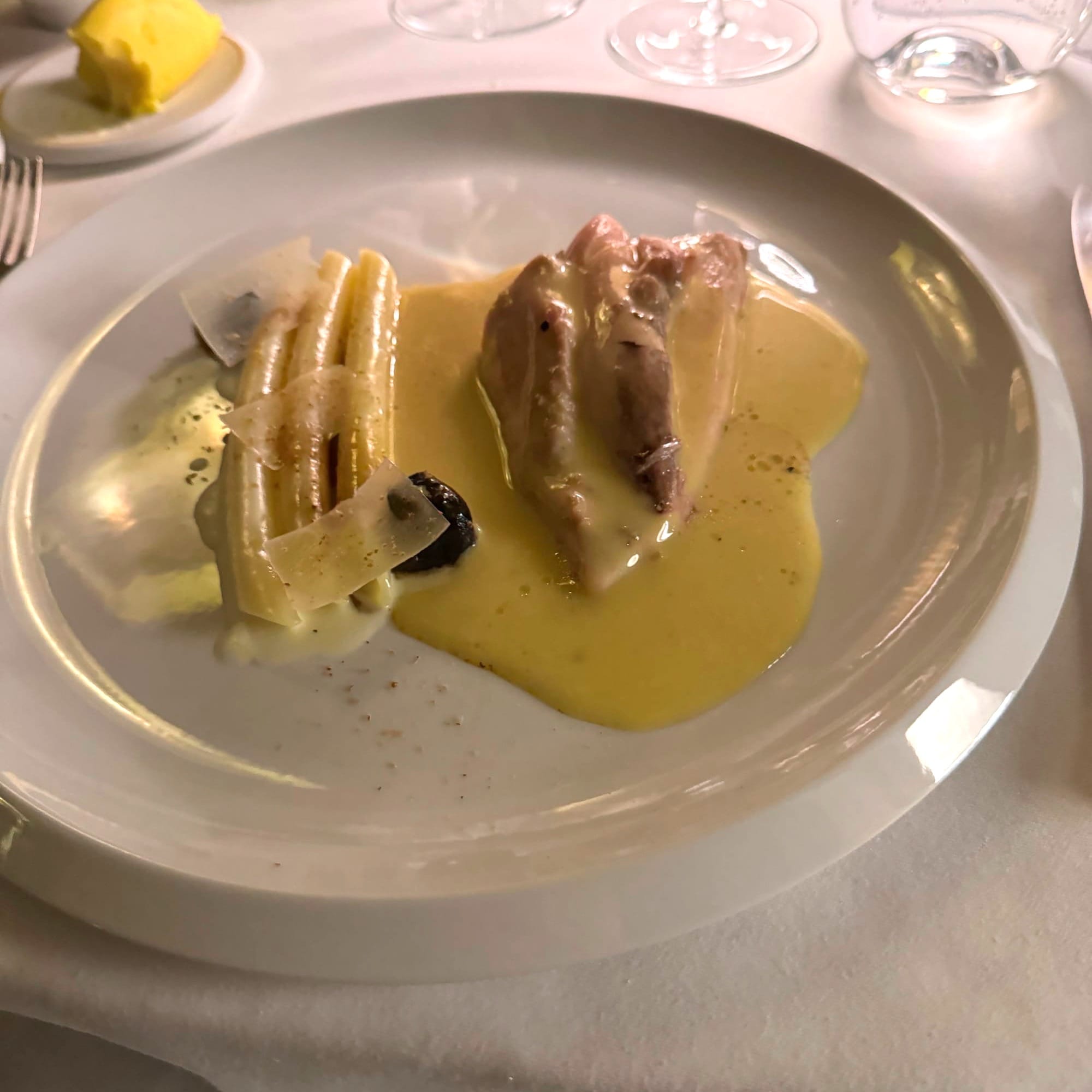 Poularde pochée with a yeast-butter sauce and nutmeg macaroni at Alleno Paris