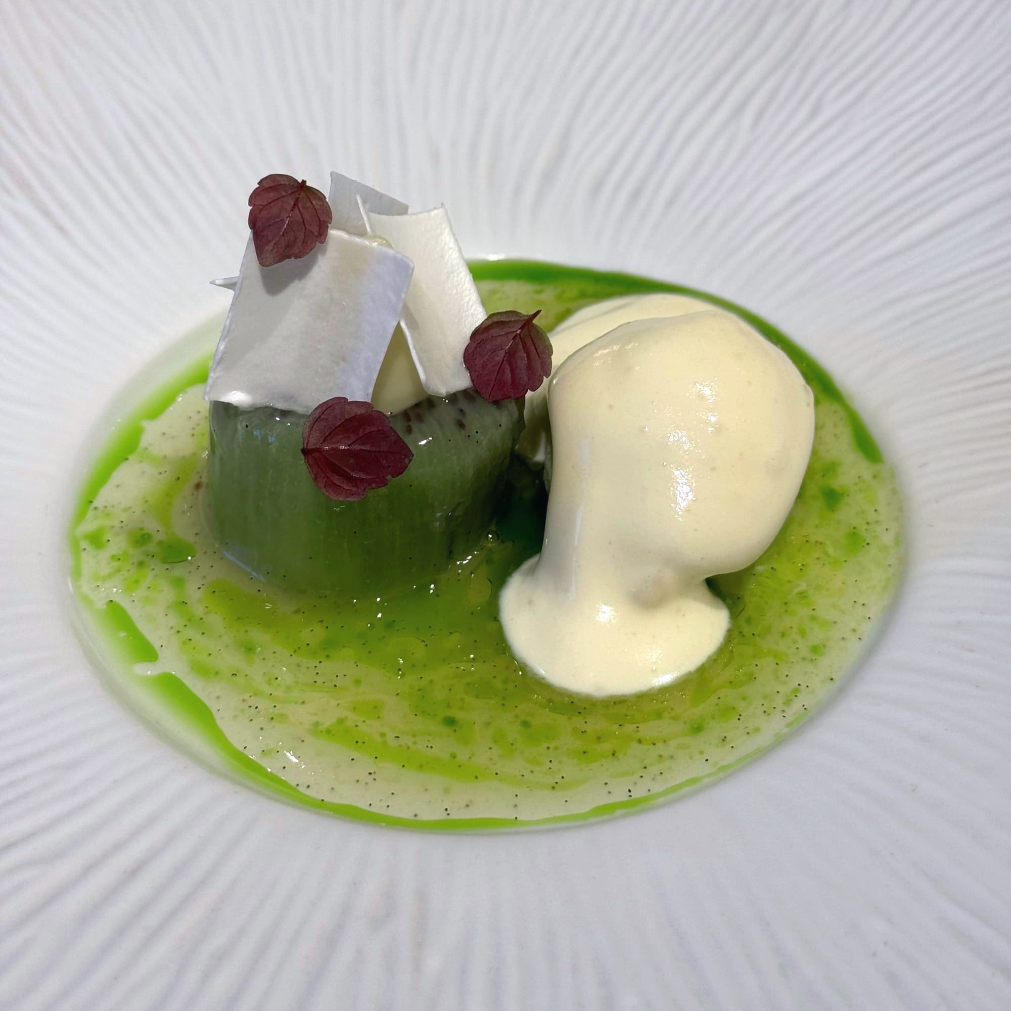 Kiwi in limestone, shiso, green Chartreuse zabaglione at Le Gabriel Paris