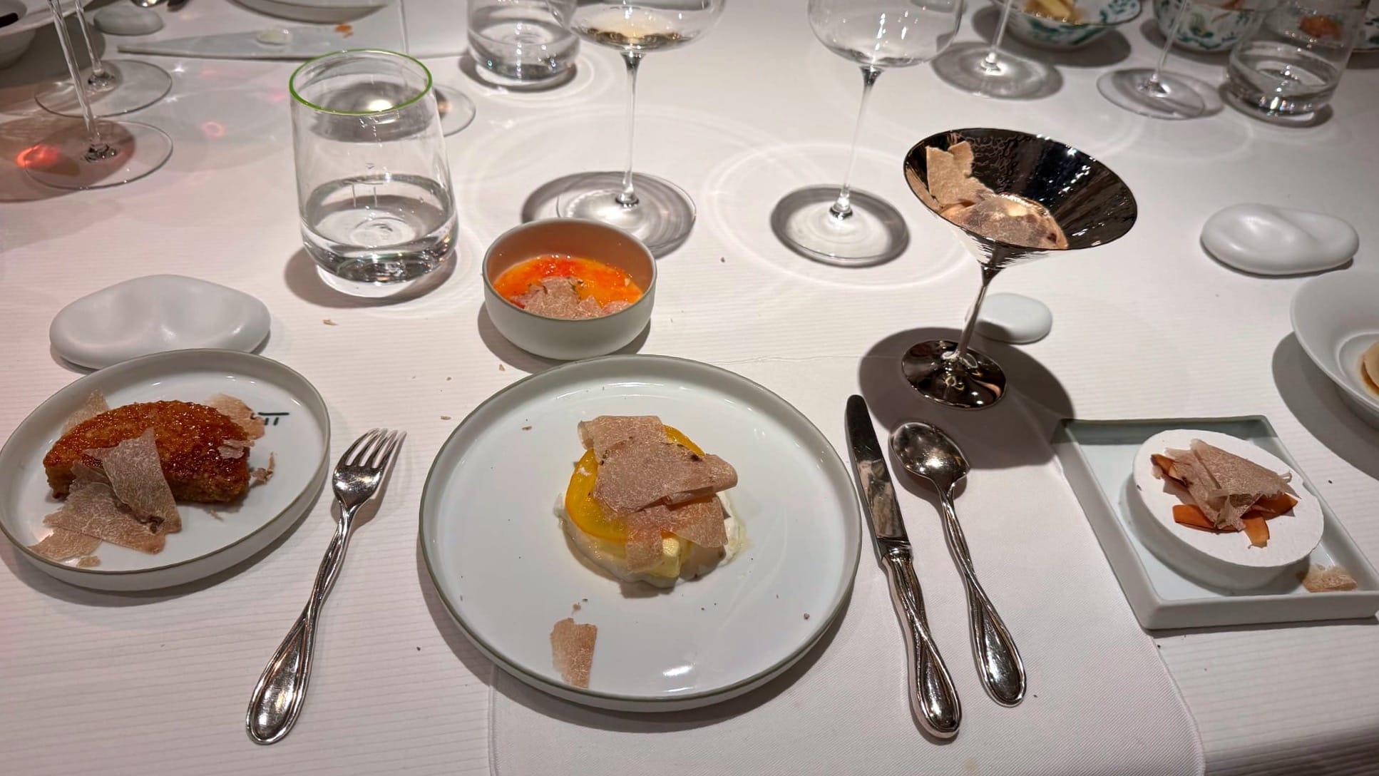 Dessert course at Pierre Gagnaire with generous white Alba truffle shavings, including stracciatella, cassata and chestnut ice cream served in a light, fragrant sequence.