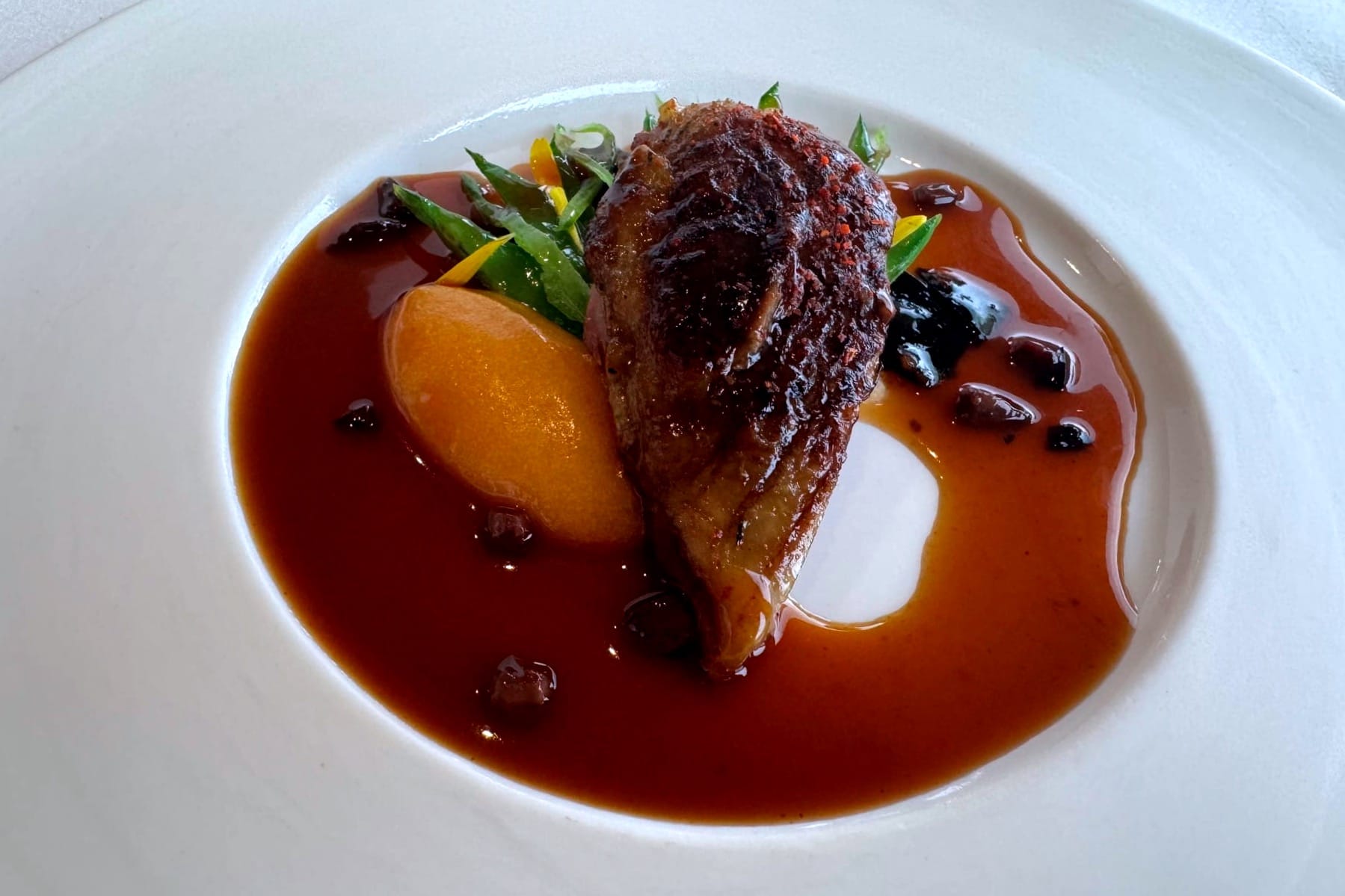 Quail with kombu seaweed, dried apricot, and Macvin