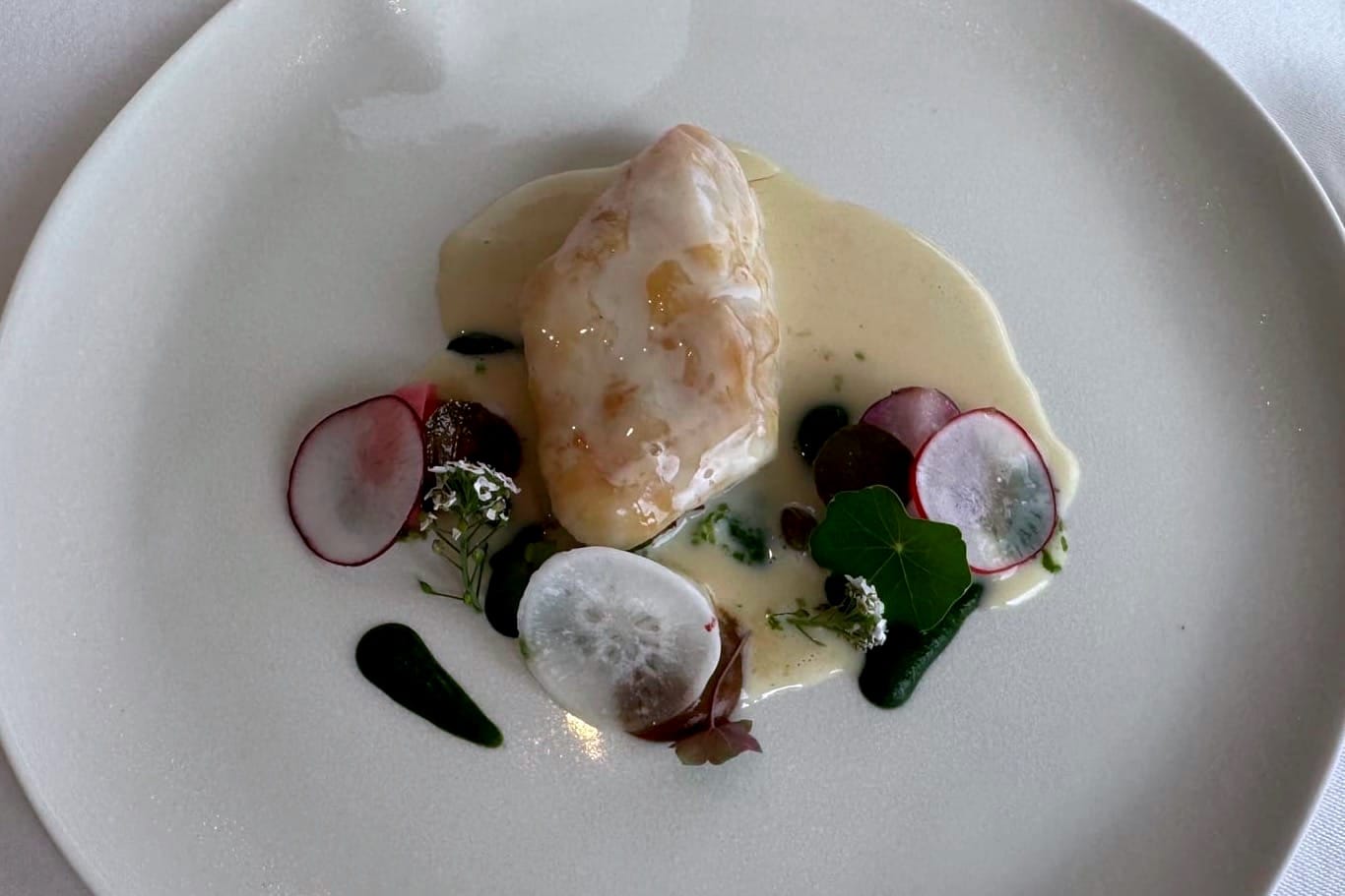 Royal sea bream with nasturtium, radish, and beurre noisette at La Chèvre d’Or Èze