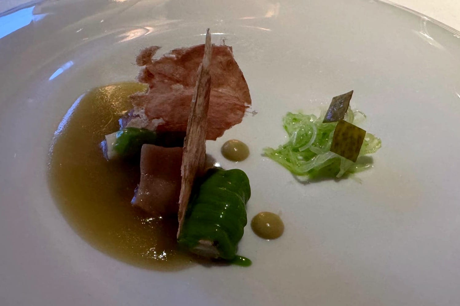 Kale juice with pork, chard stems, and razor clams at Casa Marcial