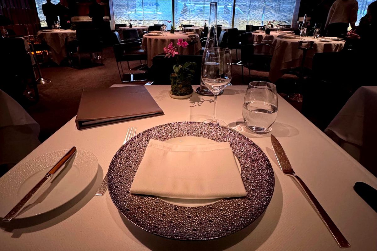 Table view at Le Bernardin in New York, a Michelin three-star fine dining restaurant known for refined seafood cuisine and elegant dining room design.
