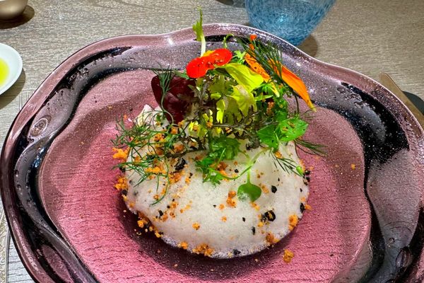 The vegetables garden, Scottish smoked salmon, arugula cream, lemon mousse, tomato vinaigrette and black olive crumble.