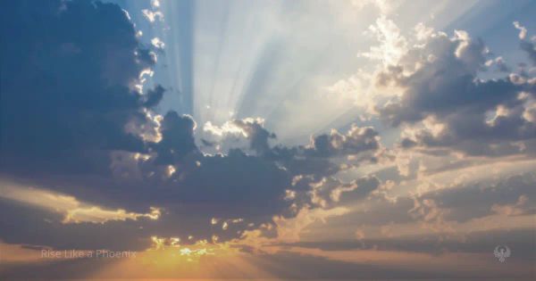 Sunlight breaking through clouds in a changing sky, symbolizing shifting conditions over time.