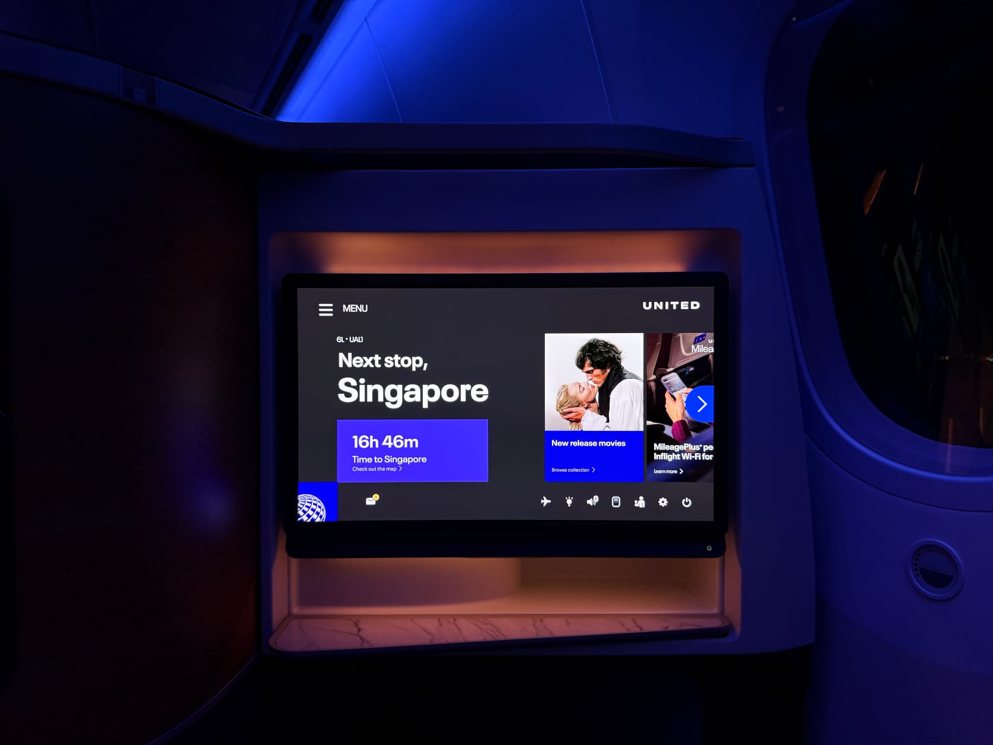 Flight information screen showing 16h46m to Singapore