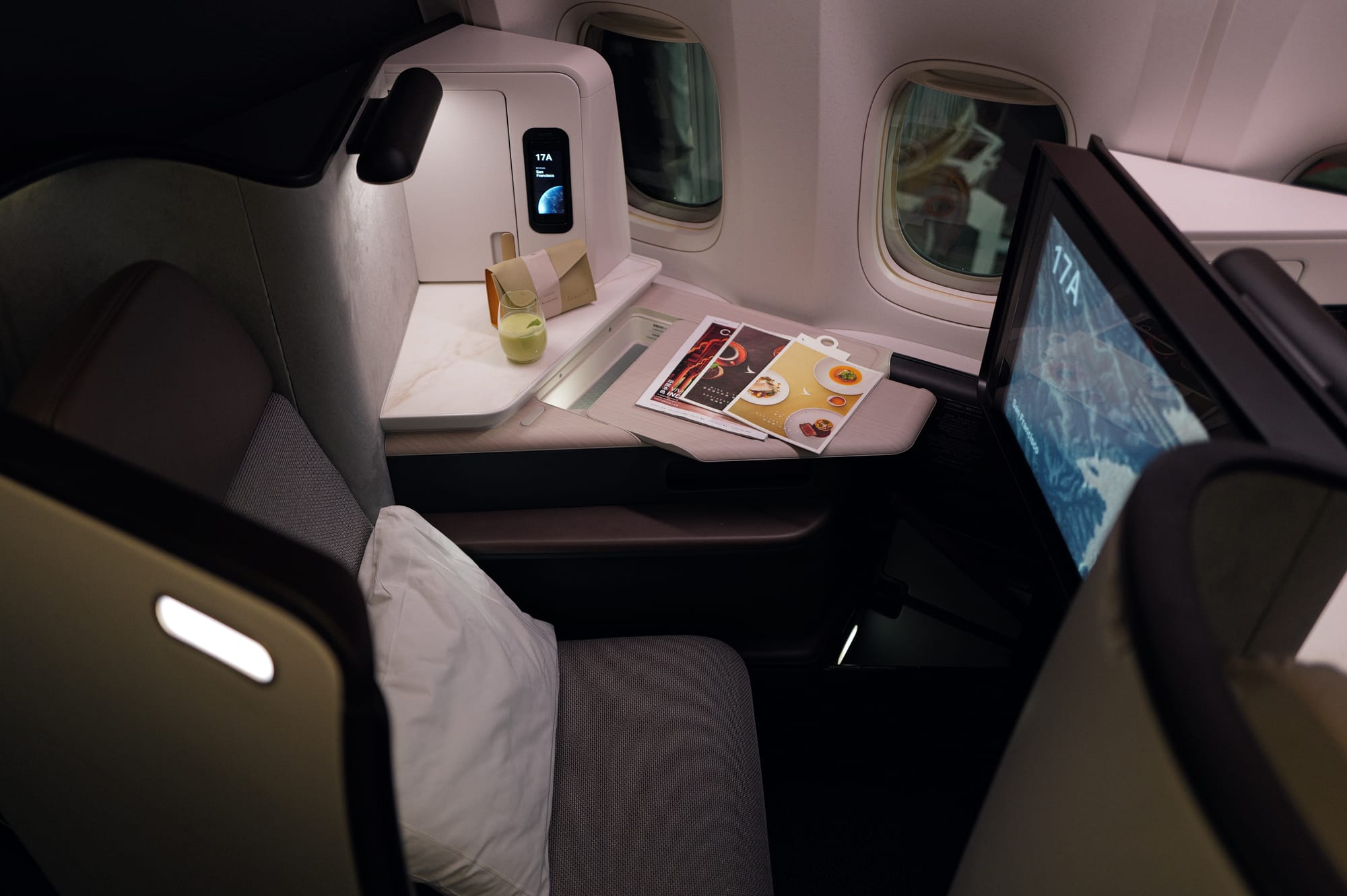 Cathay Pacific Aria Suite seat 17A with pillow and screen