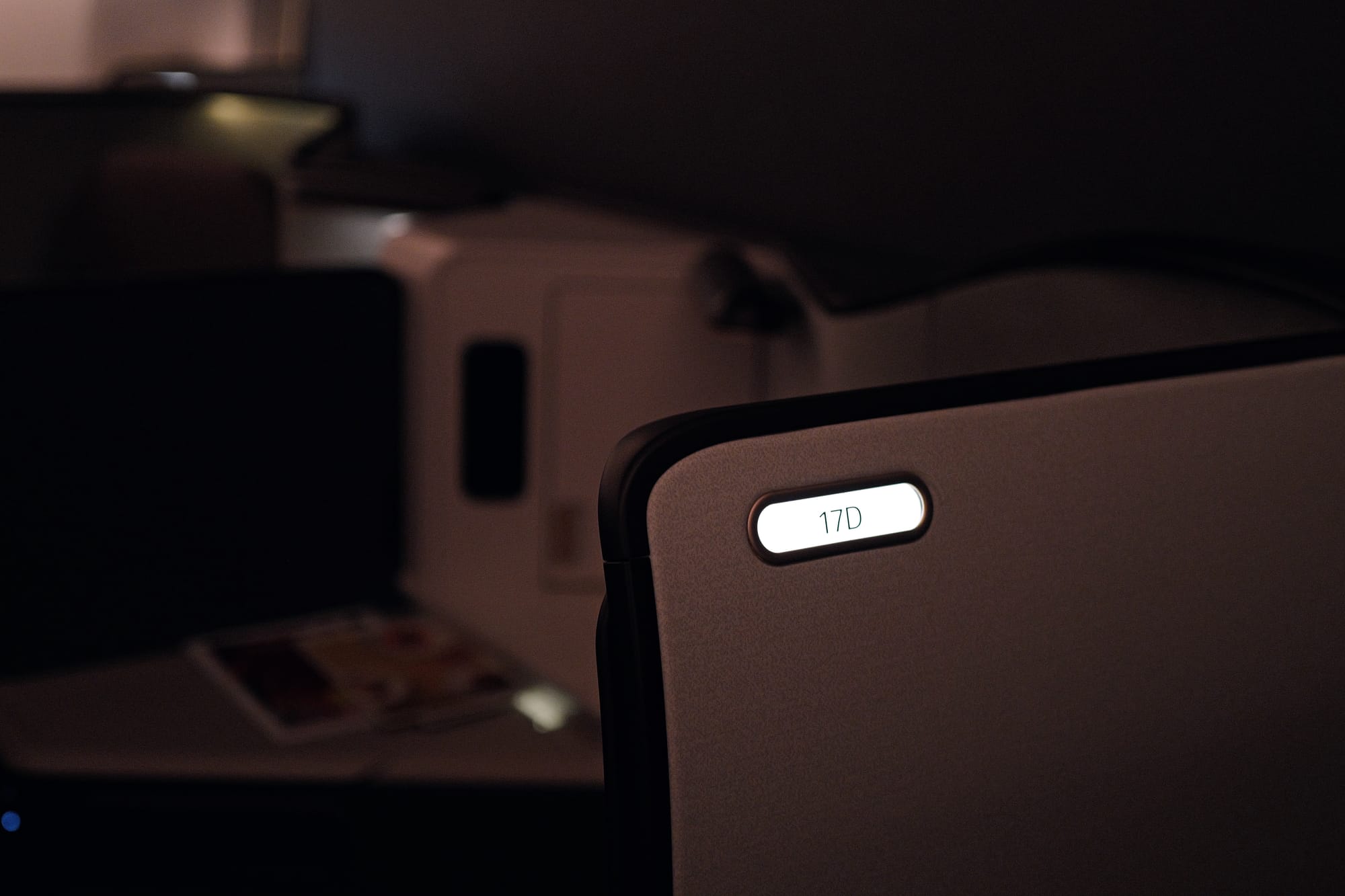 Aria Suite debossed seat number plate for 17D