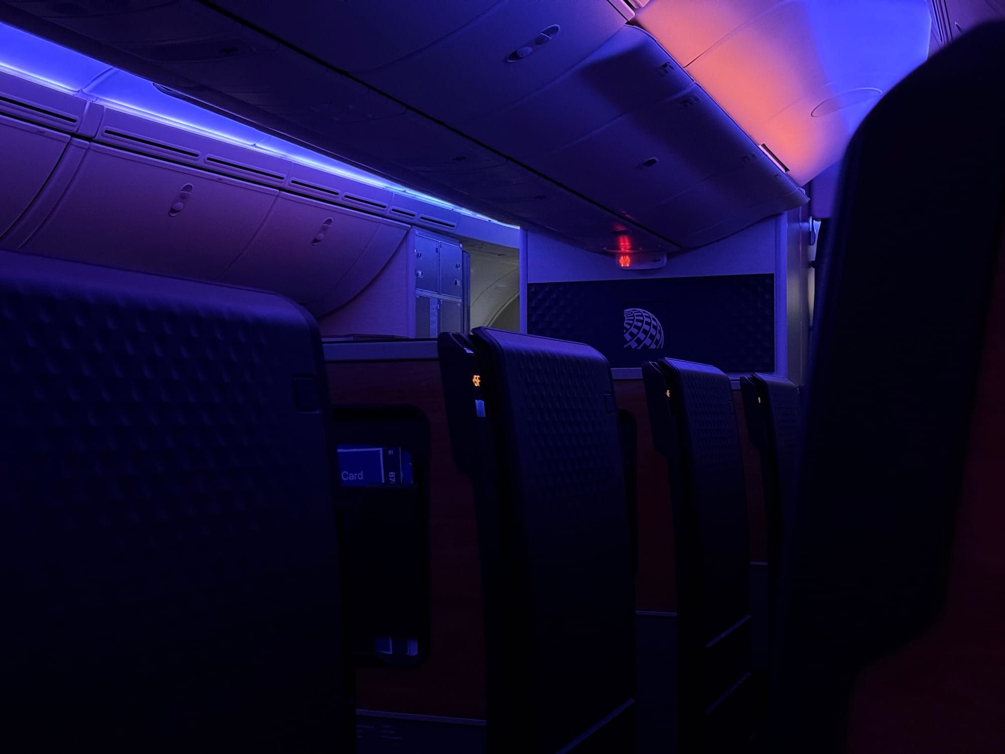 United Polaris 2.0 business class cabin aisle on the Boeing 787-9, flight UA1 to Singapore