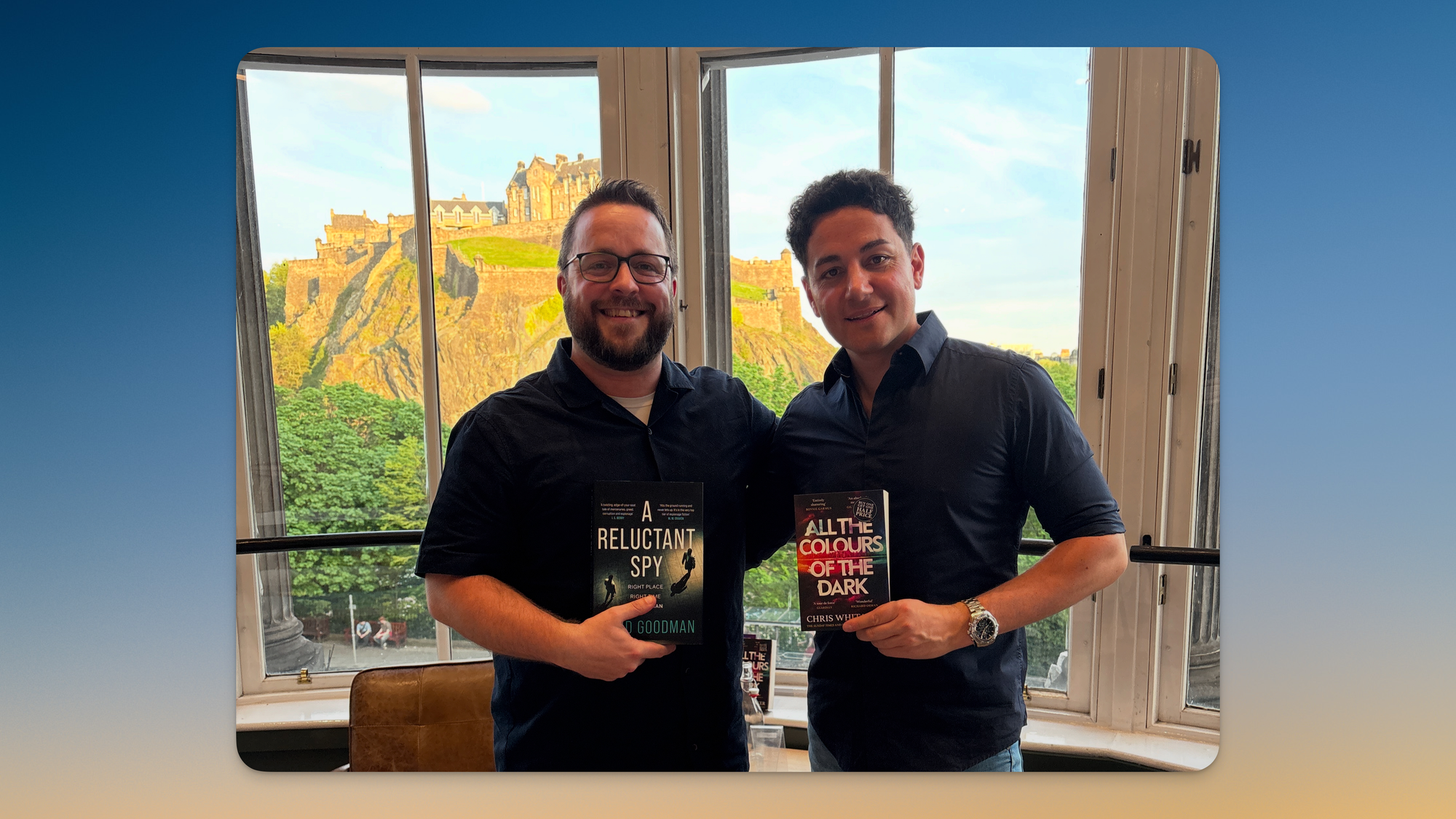 Me and Chris Whitaker, standing in a bay window in front of Edinburgh Castle
