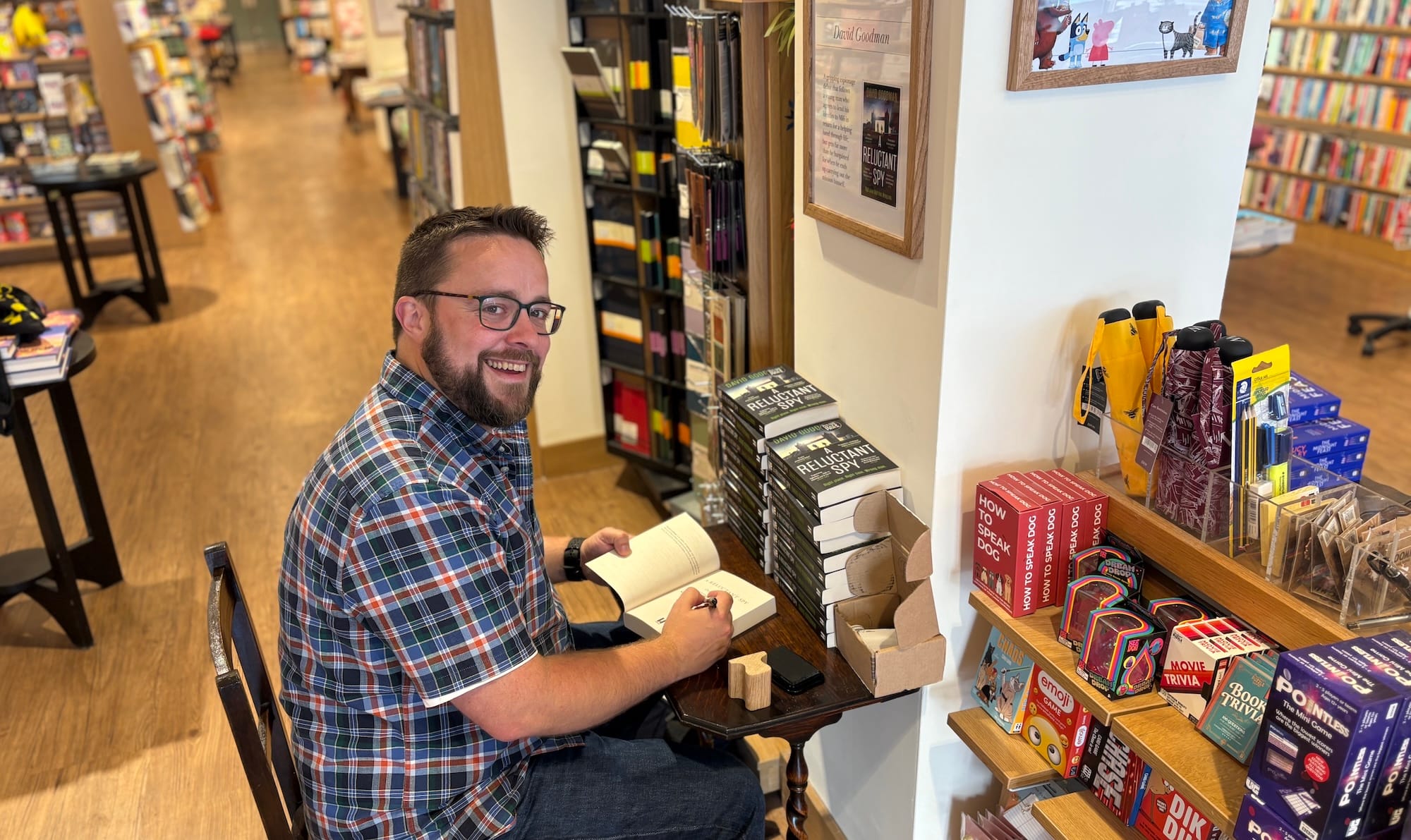 Me signing stock at a table in Wimbledon Waterstones