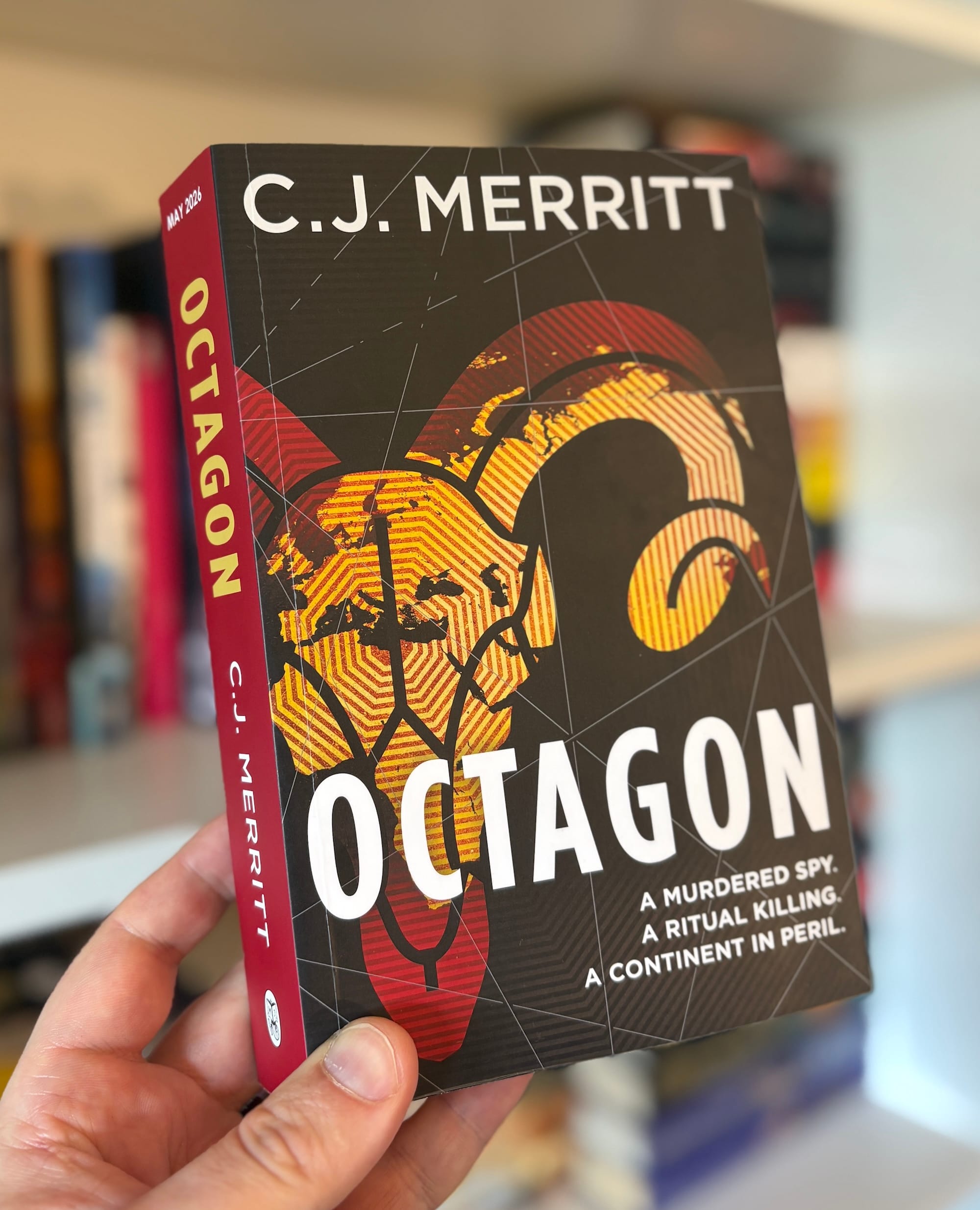 The cover for Octagon by CJ Merritt, featuring a stylised sheep skill on a black background and the tagline 'A murdered spy. A ritual killing. A continent in peril'.