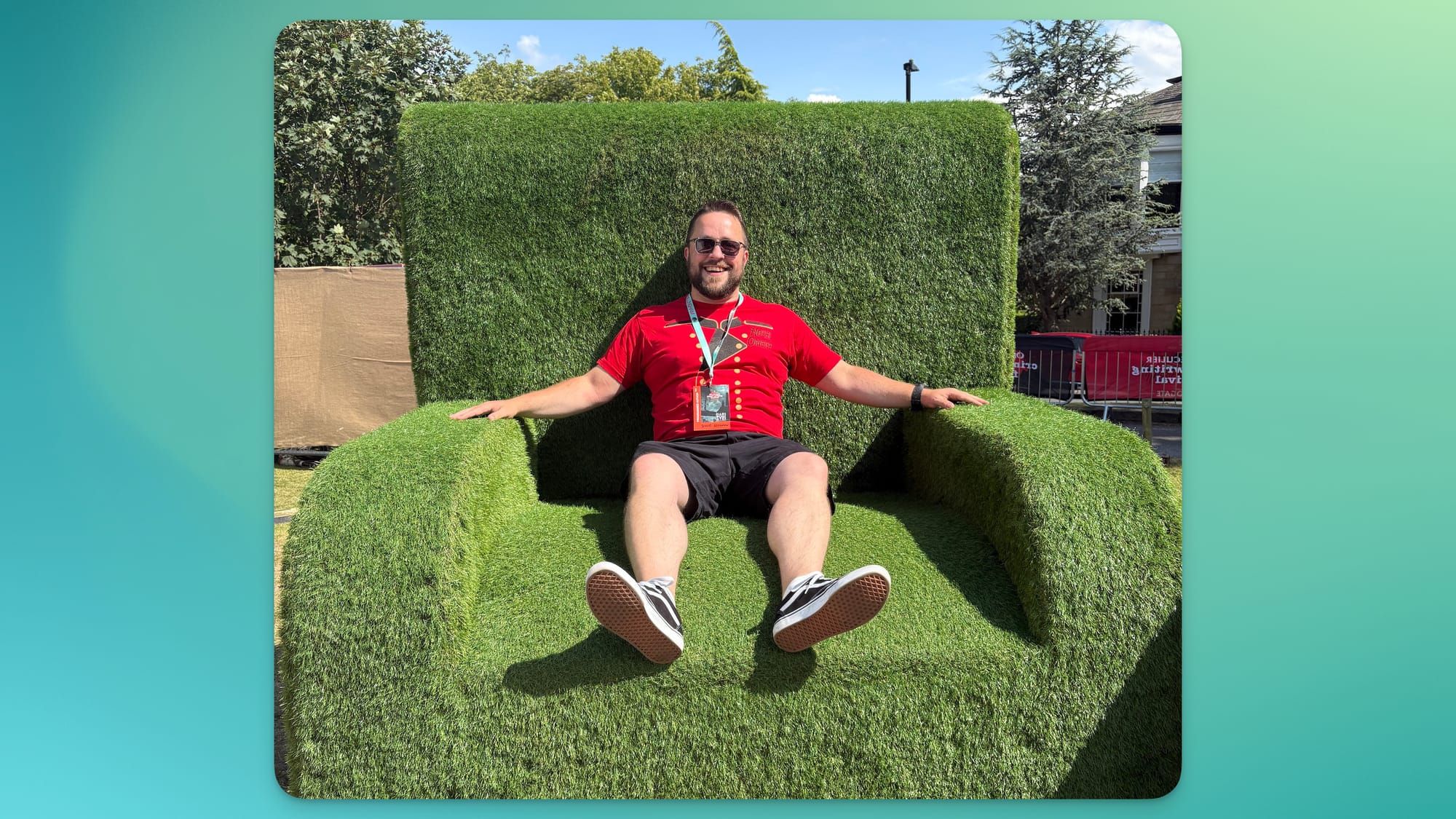 Me sitting in one of the 'Harrogate chairs', very large chairs swathed in green astroturf