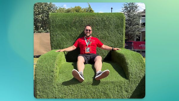 Me sitting in one of the 'Harrogate chairs', very large chairs swathed in green astroturf