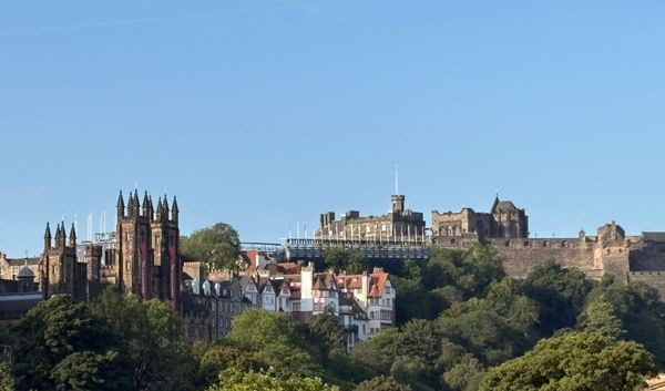 Blue sky and Edinburgh's Old Town with the Castle