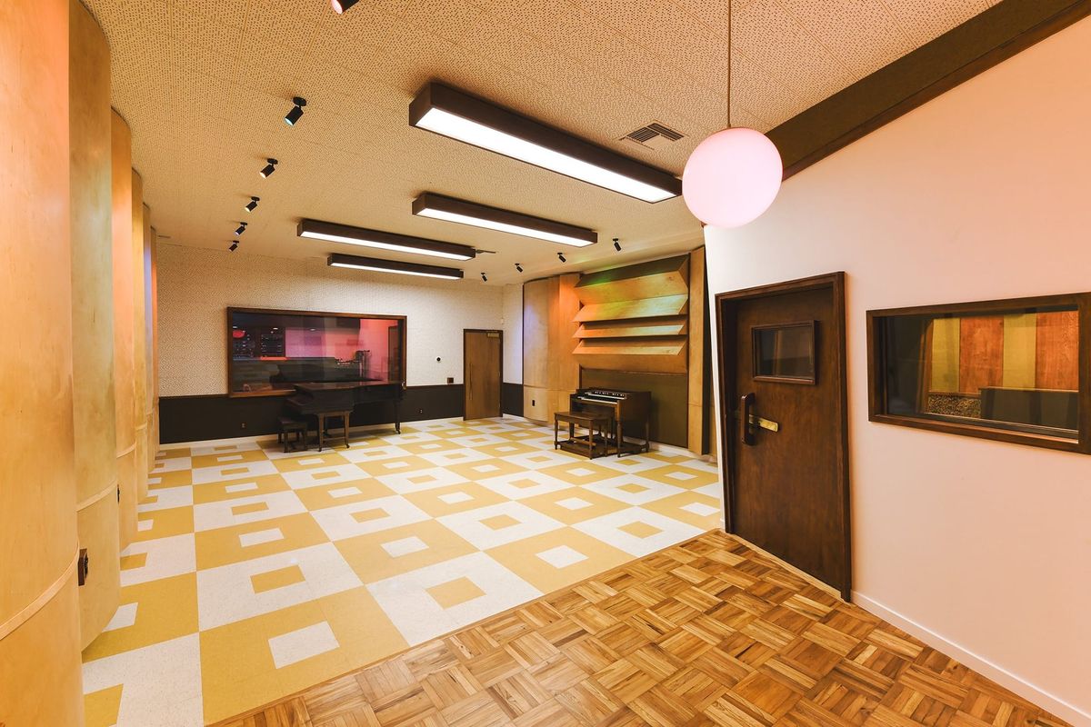 Boulevard Recording's live room with original 1967 wood walls and yellow checkerboard floor
