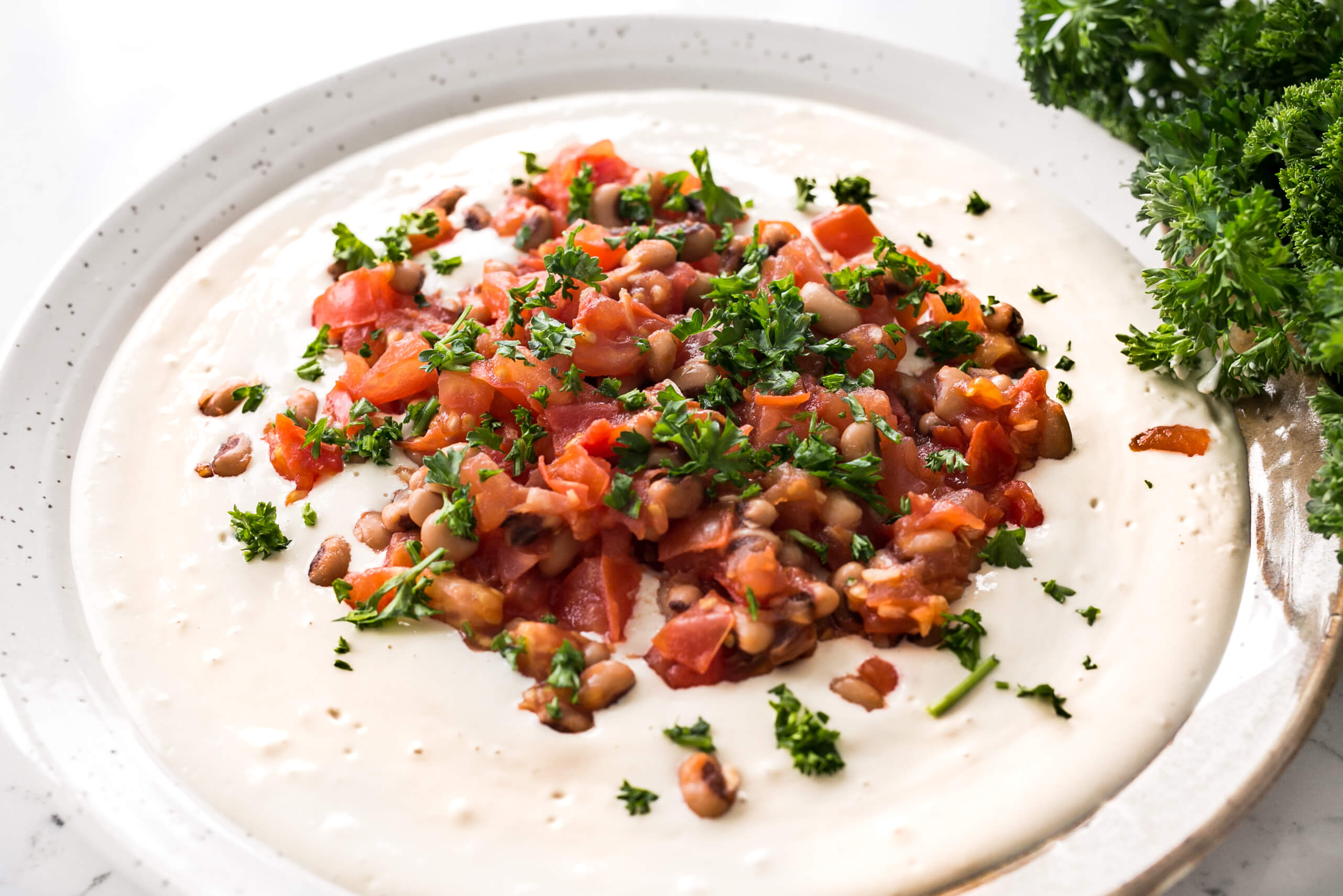 20 High Protein, Plant-Based Meals Your Clients Will Love: Black Eyed Peas Masabacha