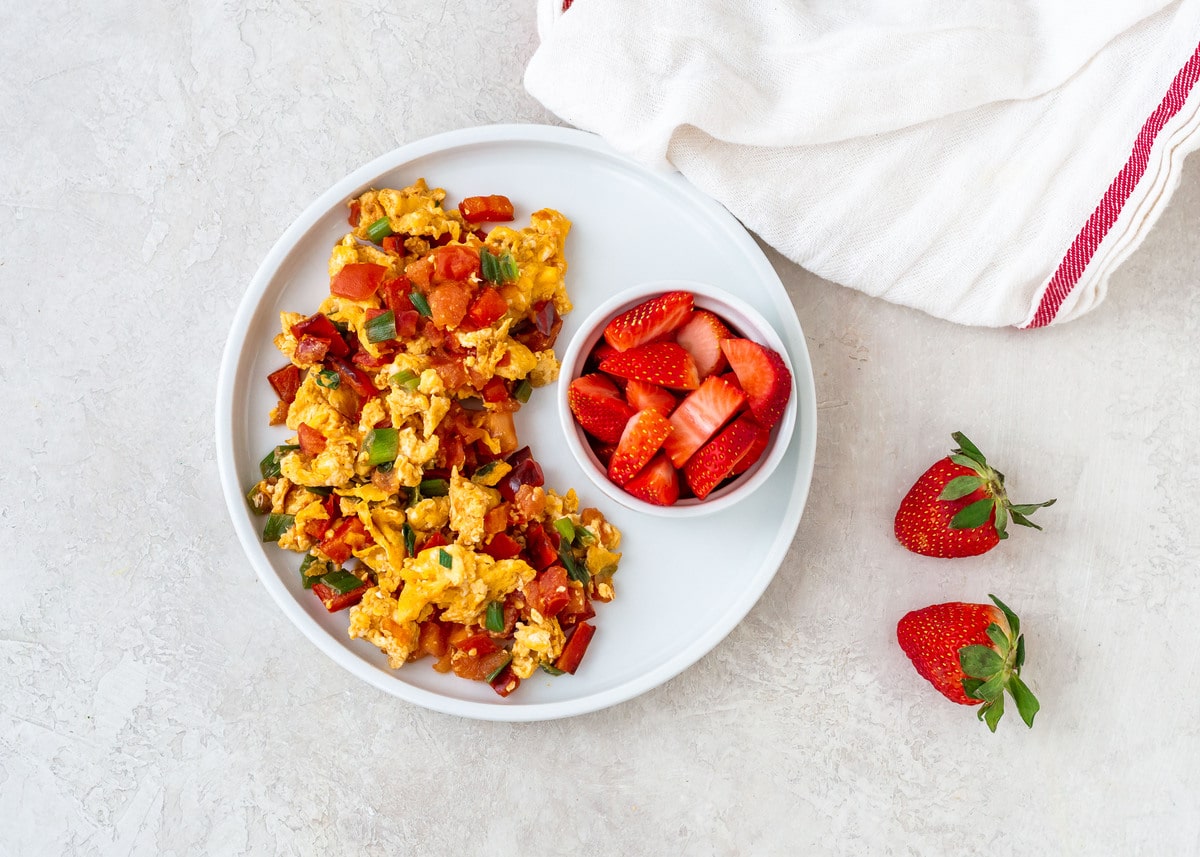 20 Meal Ideas to Support Your Clients Oral Health:Veggie Scramble with Strawberries