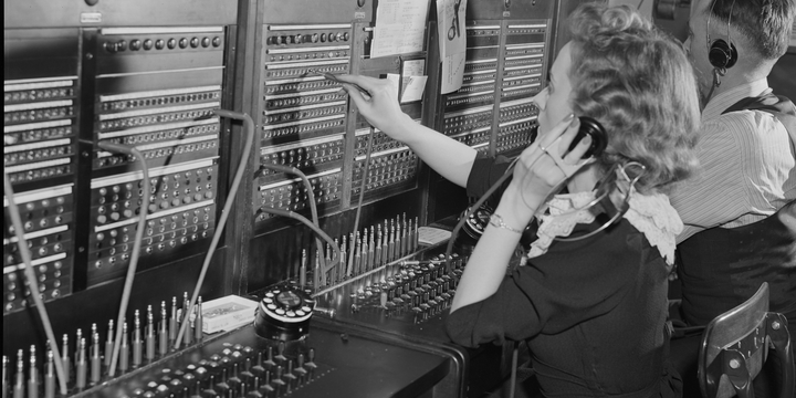 Private branch exchange (PBX) operator at her switchboard. 1947.