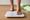 A woman stands on a scale after a run
