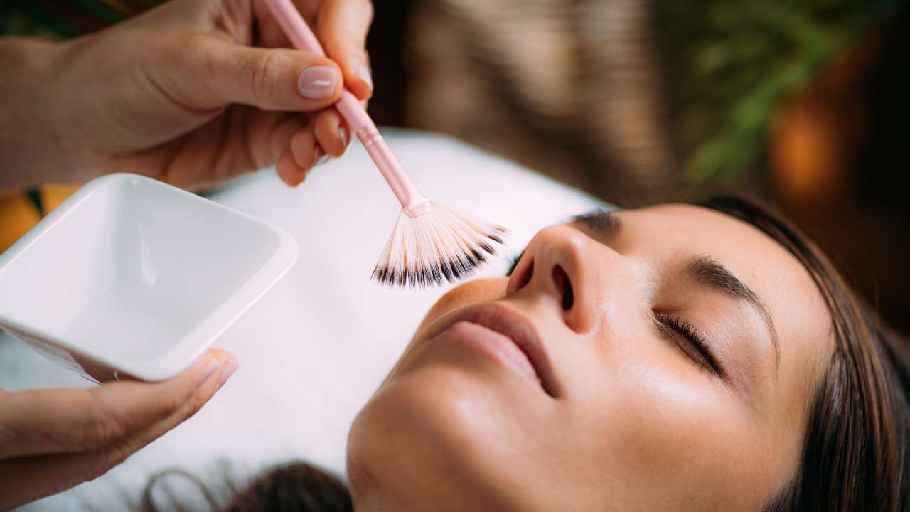 Woman undergoing chemical peeling for treatment of post inflammatory hyperpigmentation.