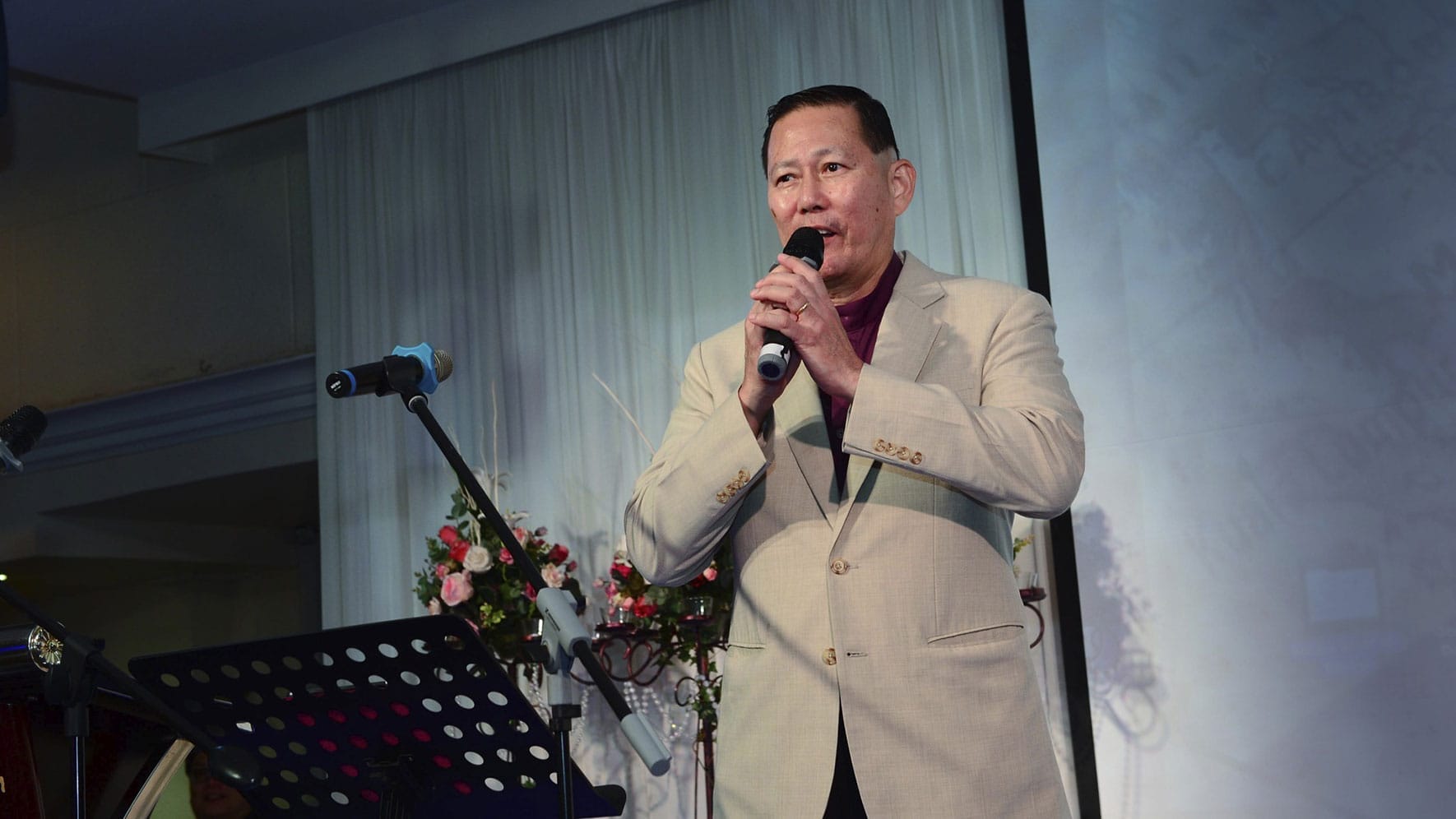 Dad speaking at an event.