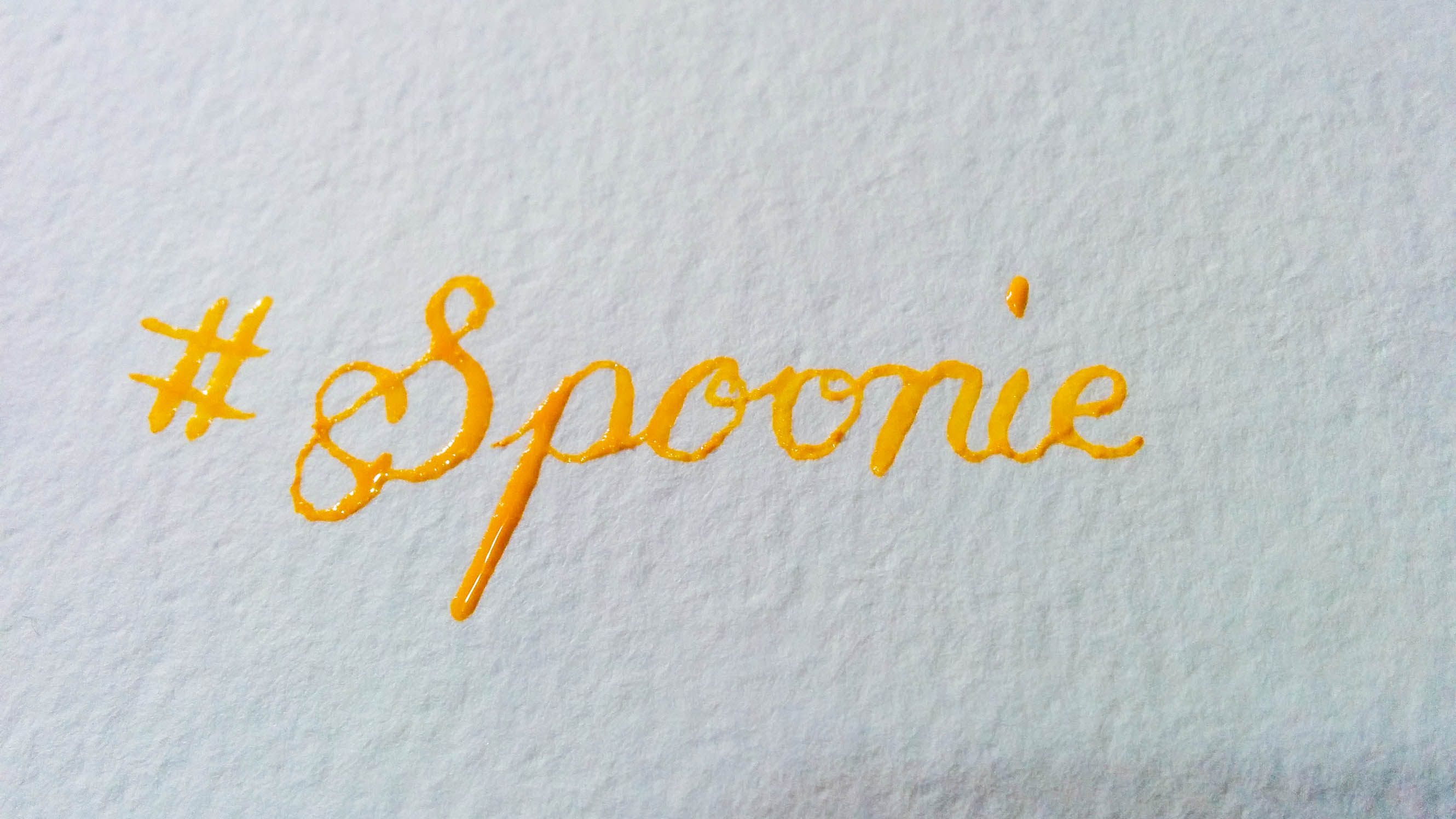 Practising calligraphy with watercolour paint. The spoonies will get this one 😉