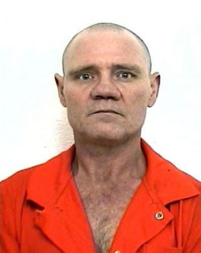 Billy Dean Riley's Oklahoma booking photograph.