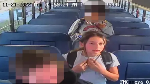 Madalina Cojocari getting off the school bus.