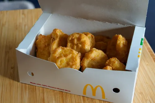An open 10-piece box of McDonald's Chicken McNuggets.