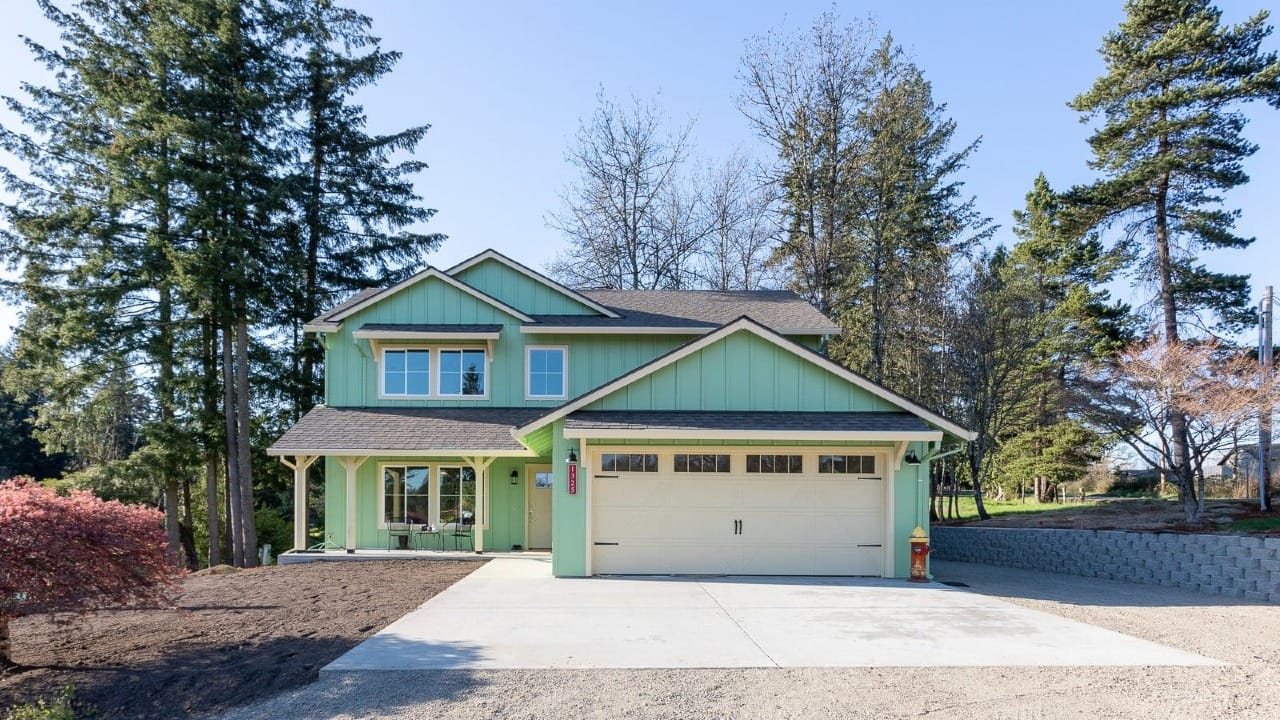 A house with light-green siding