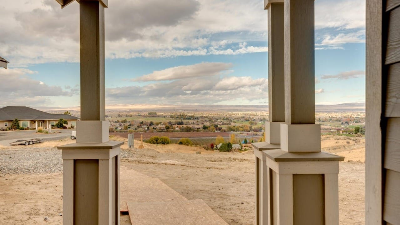 A view of a valley from a doorway
