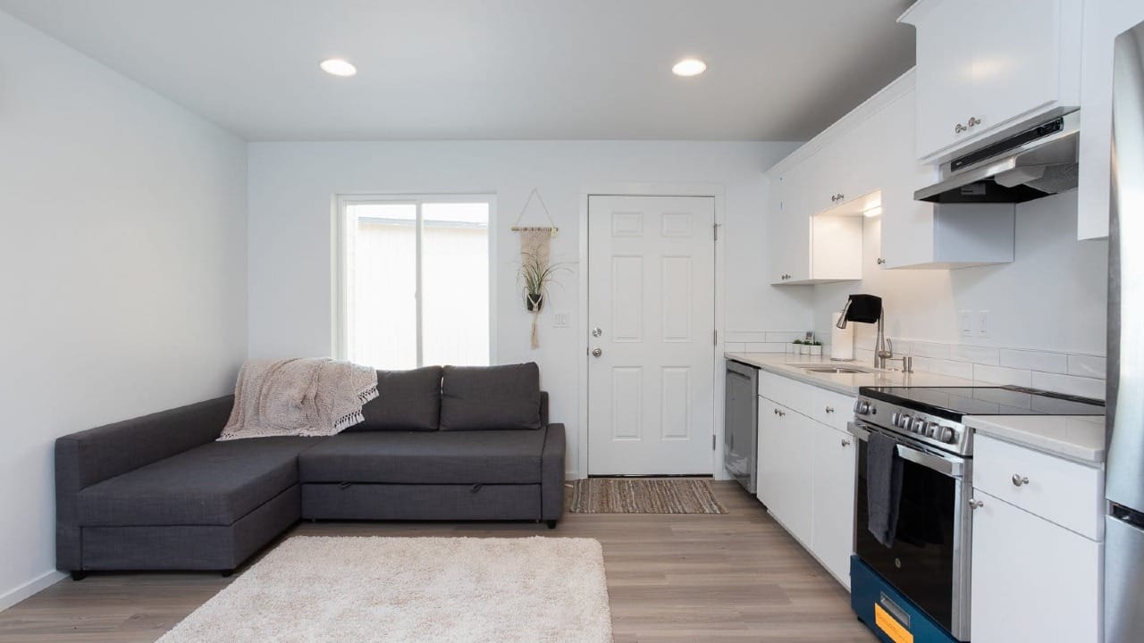 Kitchen with a couch nearby