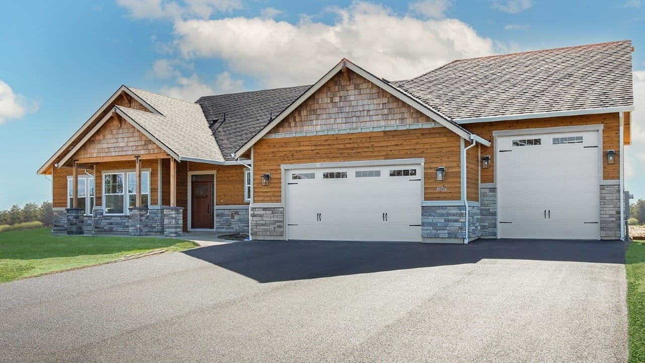 A house with stone and wood on the outside