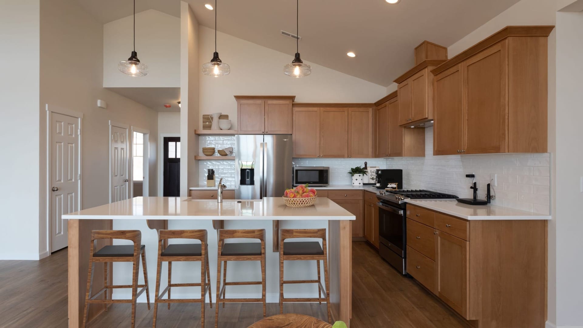 A kitchen with brown cupboards