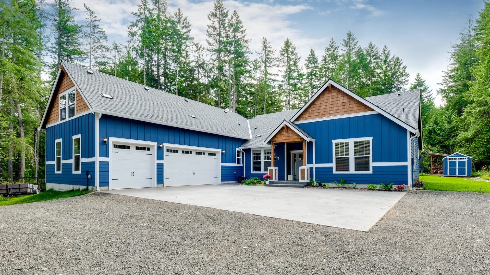 A super blue house with wood accents