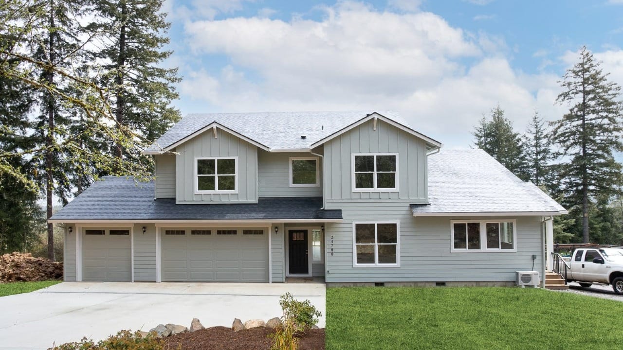 A house with light-green siding