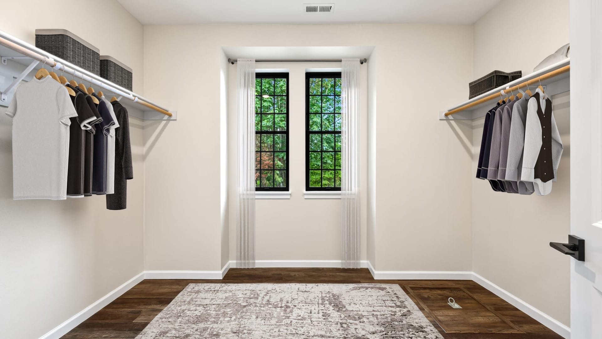 A walk-in closet ready to hold more clothes and storage