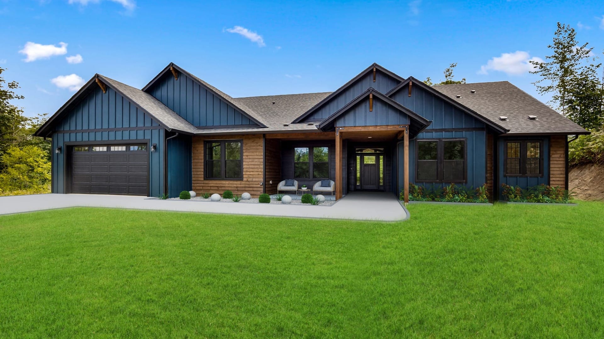 A house surrounded by green grass painted with blue paint