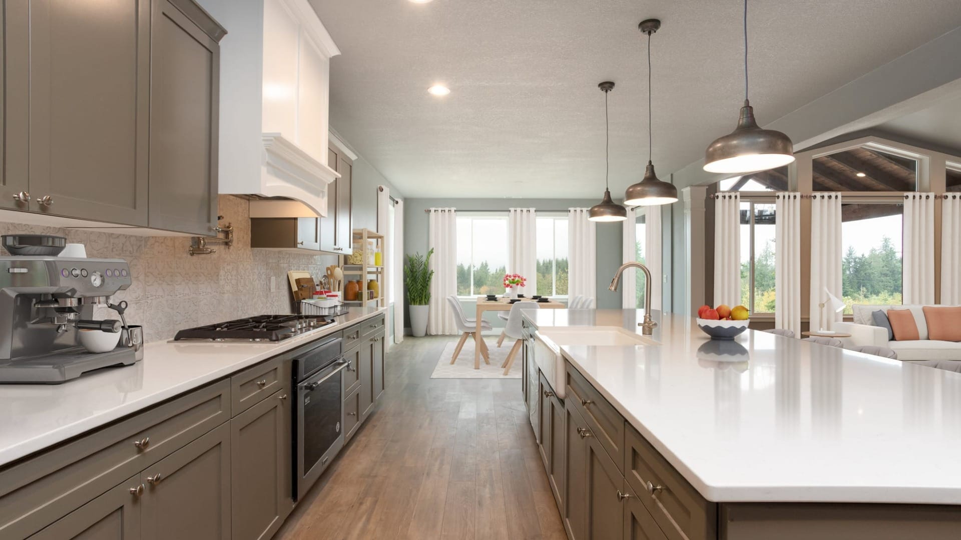 A kitchen with dark cupboards