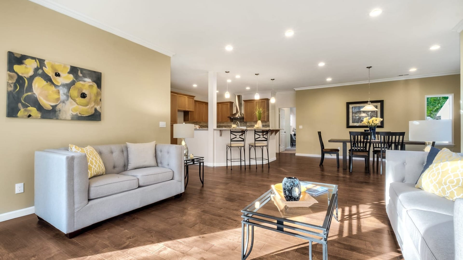 A living room with a couch and tables